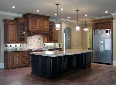 The kitchen with Wolf range and Sub-Zero refrigerator.