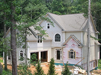 The siding and shake are being installed.