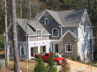 The interior progresses and the landscaping is almost done.