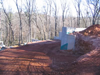 Concrete forms have been removed and water proofing applied.