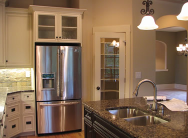 Pantry has a glass front door.