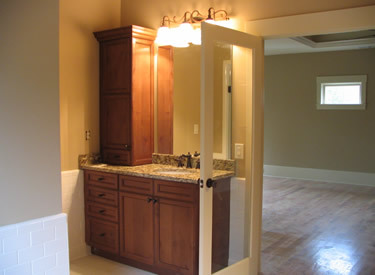 Custom vanity and granite tops in the master bathroom.